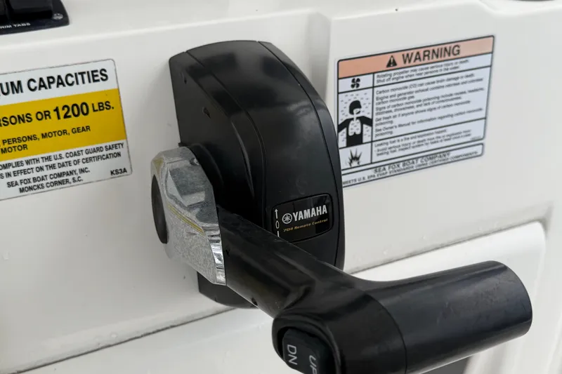 Slide: The Image of Yamaha throttle control on 2020 Sea Fox 228 Commander boat with safety warnings. - 29