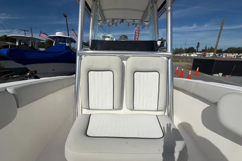 Slide: The Image of 2020 Sea Fox 228 Commander boat interior with white seating and console. - 15