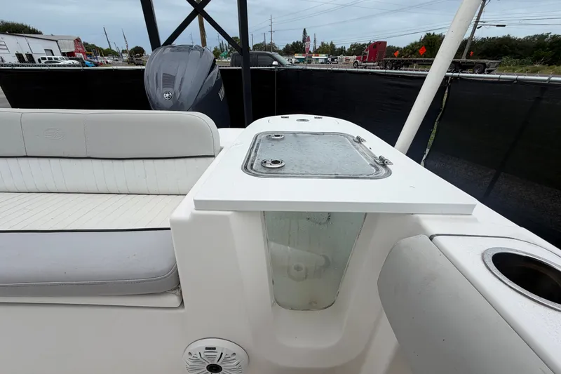 Slide: The Image of 2020 Sea Fox 228 Commander boat interior with seating and storage compartment. - 65