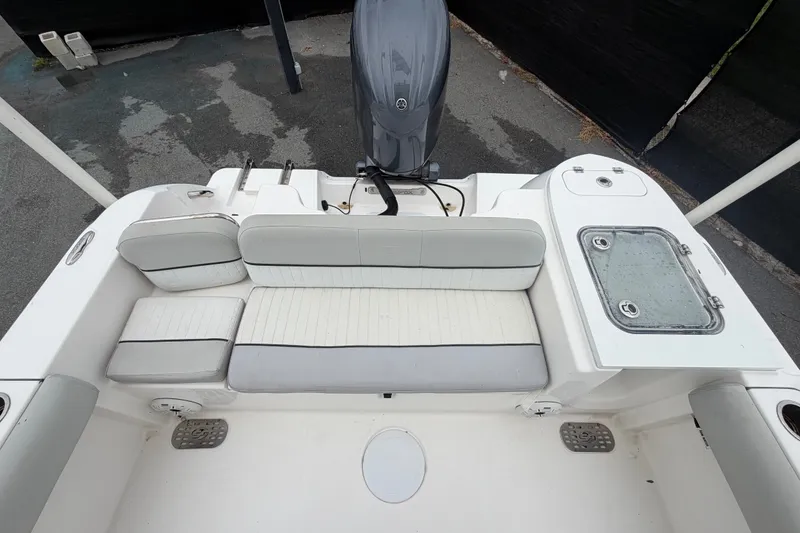 Slide: The Image of 2020 Sea Fox 228 Commander boat interior with seating and engine view. - 59