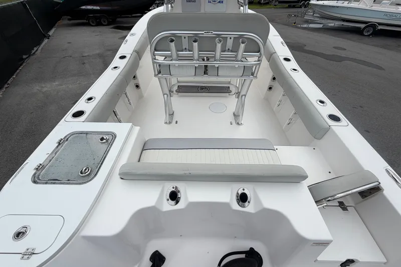 Slide: The Image of 2020 Sea Fox 228 Commander boat interior with seating and rod holders. - 14