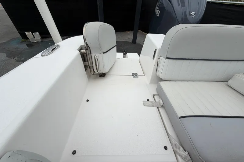 Slide: The Image of 2020 Sea Fox 228 Commander boat interior with white seating and deck. - 62
