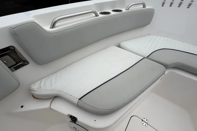 Slide: The Image of 2020 Sea Fox 228 Commander boat seating with cup holders and stainless steel handles. - 43
