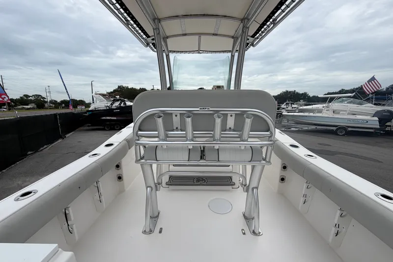 Slide: The Image of 2020 Sea Fox 228 Commander boat interior with rod holders and seating. - 16