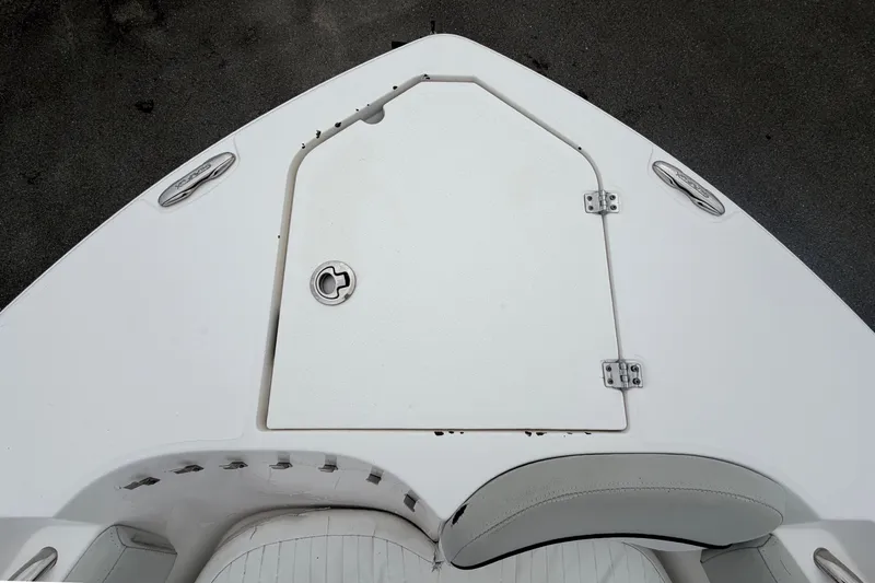 Slide: The Image of The bow of a 2020 Sea Fox 228 Commander with a storage hatch and seating. - 48