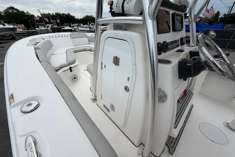 Slide: The Image of 2020 Sea Fox 228 Commander boat interior with steering console and seating area. - 33