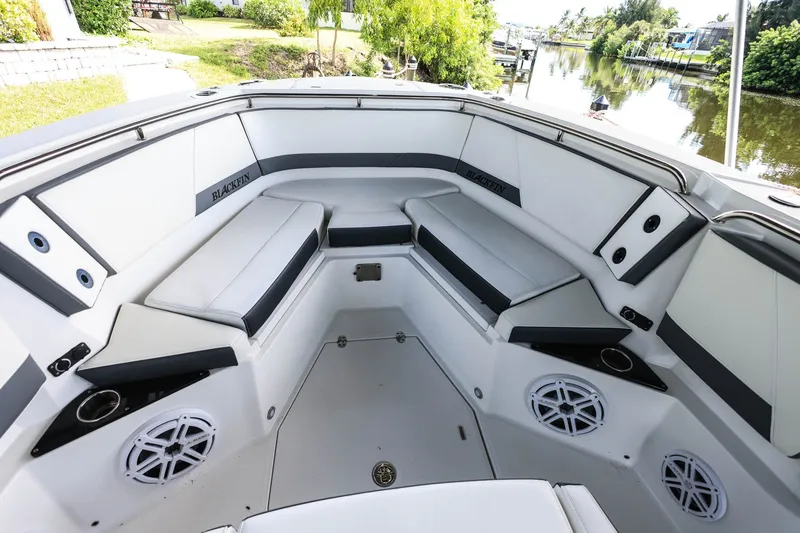 Slide: The Image of Spacious interior of 2019 Blackfin 272 CC boat with comfortable seating and modern design. - 13