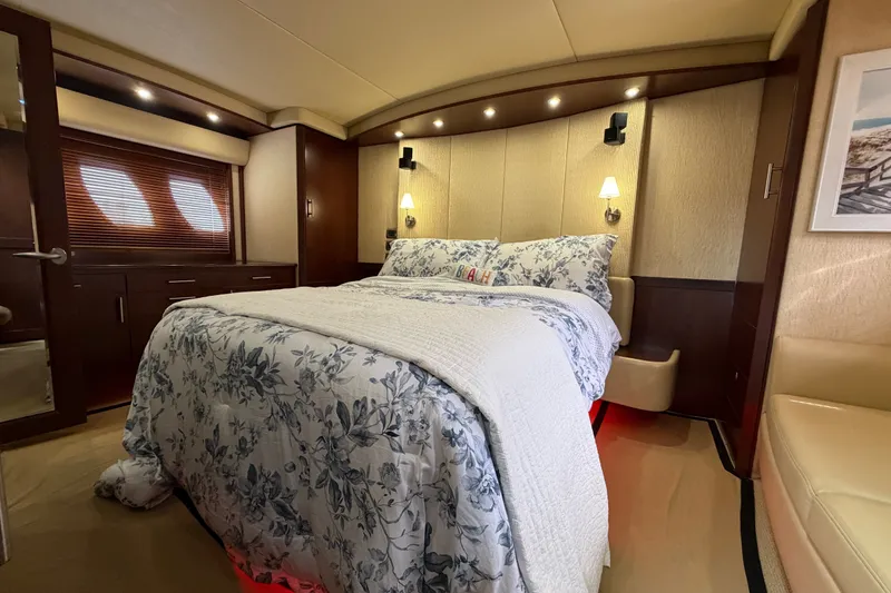 Slide: The Image of Luxurious bedroom interior of 2006 Sea Ray 60 Sundancer yacht with elegant bedding. - 29
