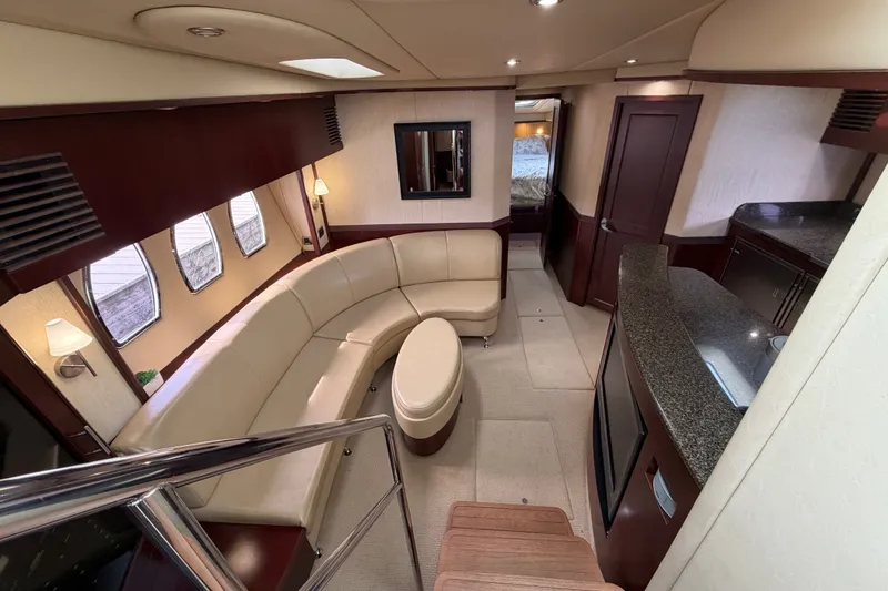 Slide: The Image of Luxurious interior of 2006 Sea Ray 60 Sundancer yacht with elegant seating and modern amenities. - 37