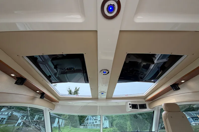 Slide: The Image of Interior view of 2006 Sea Ray 60 Sundancer yacht with skylights and modern lighting. - 43