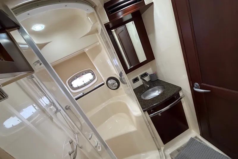 Slide: The Image of Luxurious bathroom in 2006 Sea Ray 60 Sundancer yacht with modern fixtures and elegant design. - 15