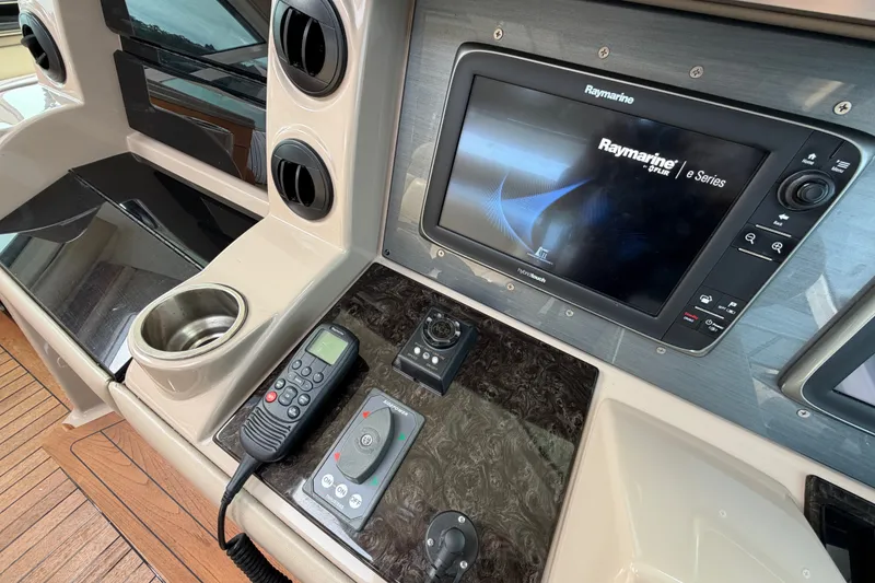 Slide: The Image of Control panel of a 2006 Sea Ray 60 Sundancer with Raymarine e-Series display. - 38