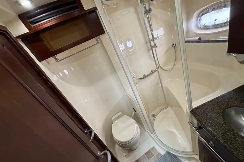 Slide: The Image of Luxurious bathroom in 2006 Sea Ray 60 Sundancer yacht with shower and toilet. - 17