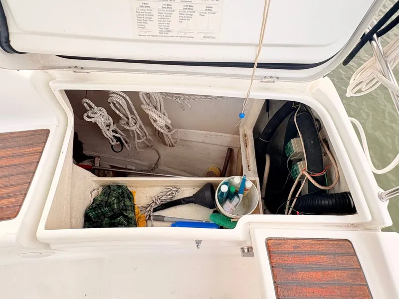 Slide: The Image of Storage compartment on a Beneteau Oceanis Clipper 343 with ropes and equipment. - 16