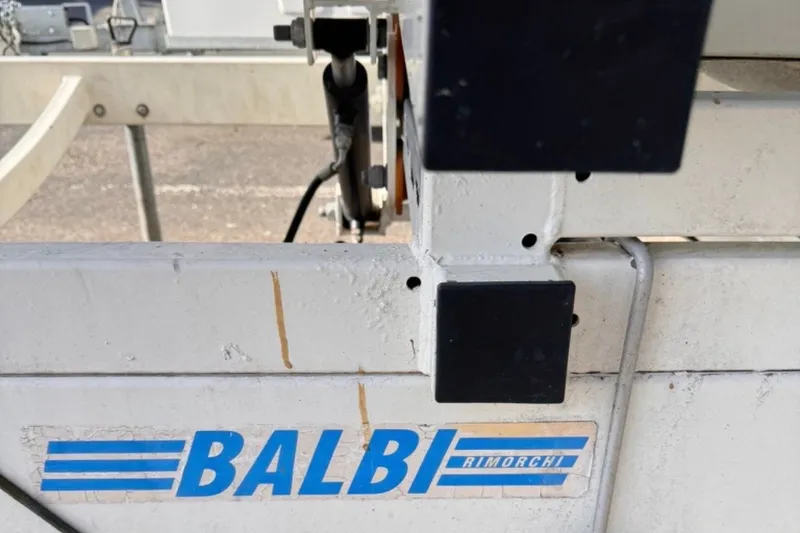 Slide: The Image of Trailer hitch detail with "BALBI Rimorchi" logo, associated with a 2008 Melges 32. - 15