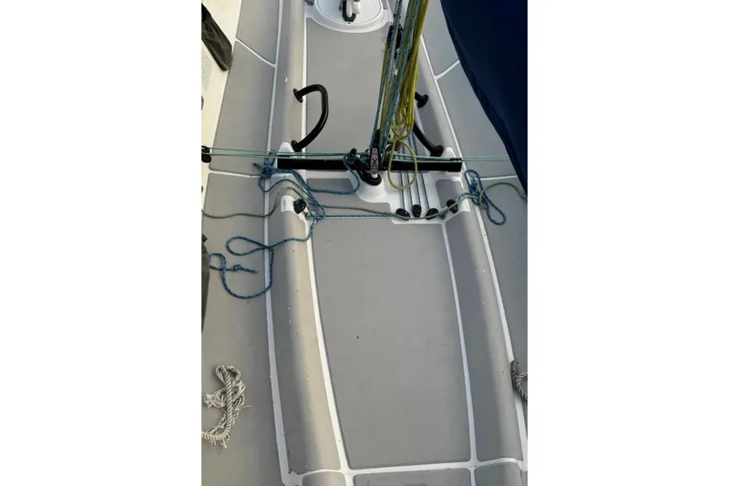 Slide: The Image of Deck view of a 2008 Melges 32 sailboat with rigging and ropes. - 9