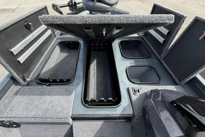 Slide: The Image of 2027 Ranger RT188P boat interior with open storage compartments and seating. - 10