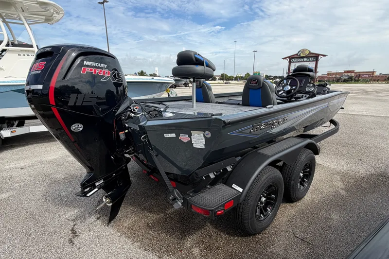 Slide: The Image of 2027 Ranger RT188P boat with Mercury Pro XS engine in parking lot. - 111