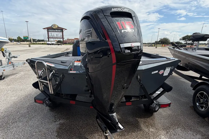 Slide: The Image of 2027 Ranger RT188P boat with Mercury 115 Pro outboard motor in parking lot. - 5