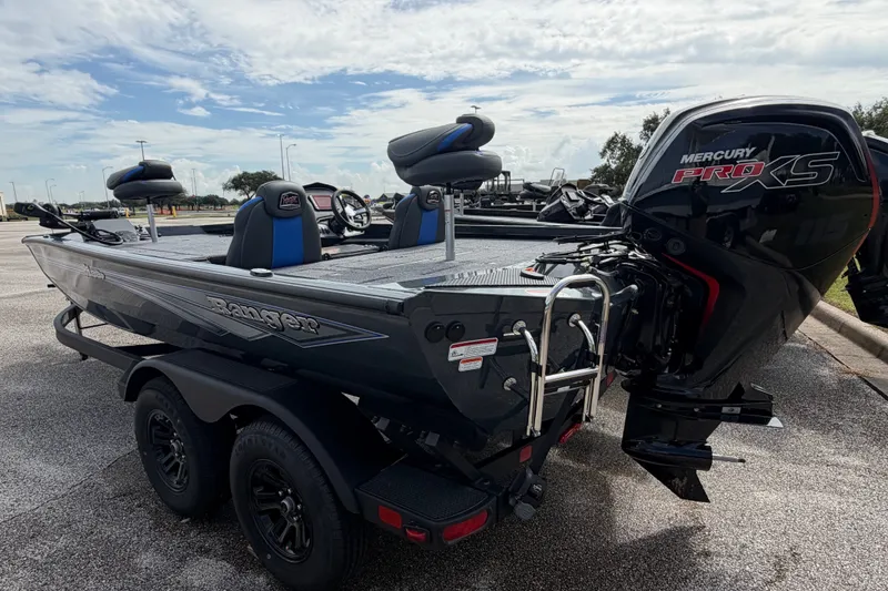 Slide: The Image of 2027 Ranger RT188P boat with Mercury Pro XS engine in a parking lot. - 4