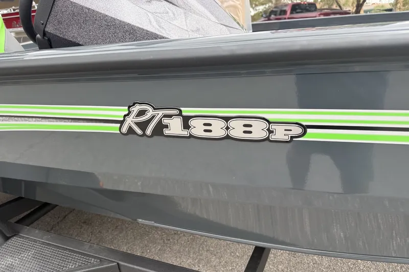 Slide: The Image of 2027 Ranger RT188P boat with green stripe detail on the side. - 8