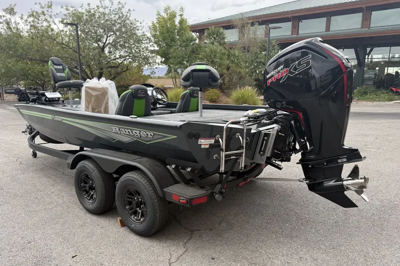 Slide: The Image of 2027 Ranger RT188P boat with Mercury Pro XS engine, parked outdoors on a trailer. - 4