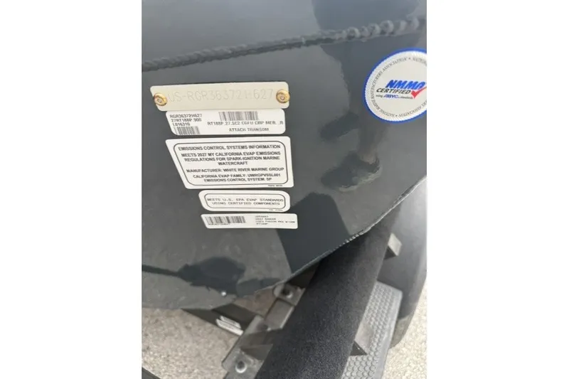 Slide: The Image of 2027 Ranger RT188P boat with emission control labels and certification sticker. - 12