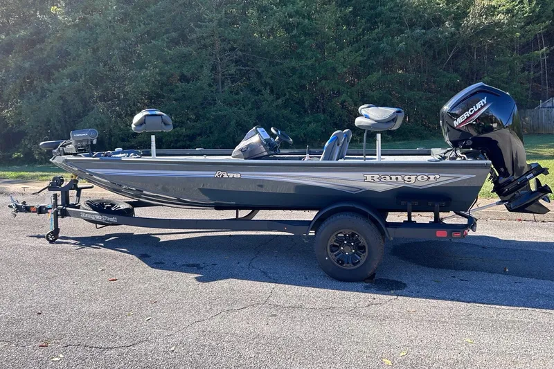 Slide: The Image of 2027 Ranger RT178 fishing boat on trailer, parked outdoors. - 1