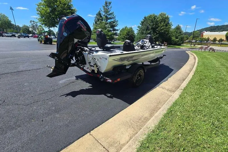 Slide: The Image of 2027 Ranger RT188 boat on trailer in sunny parking lot. - 5