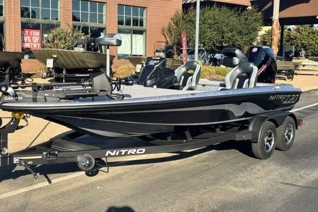 Slide: The Image of 2027 Nitro Z20 XL Pro fishing boat on trailer, parked outdoors. - 5