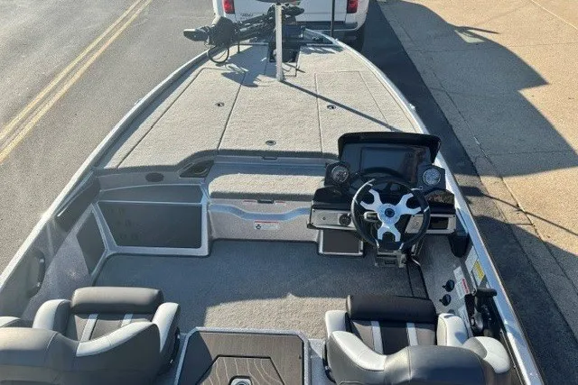 Slide: The Image of 2027 Nitro Z20 XL Pro boat interior with steering wheel and seating. - 53