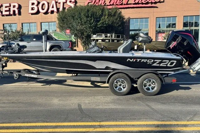 Slide: The Image of 2027 Nitro Z20 XL Pro boat on trailer, parked outside a dealership. - 1