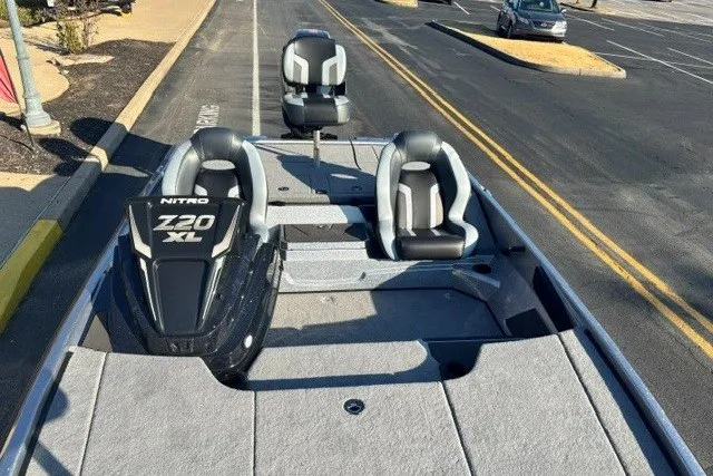 Slide: The Image of 2027 Nitro Z20 XL Pro boat with sleek seating and modern design on a road. - 3