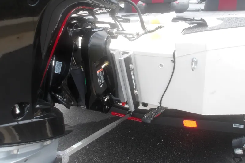 Slide: The Image of 2027 Ranger RT198P boat engine and transom detail on a trailer. - 6