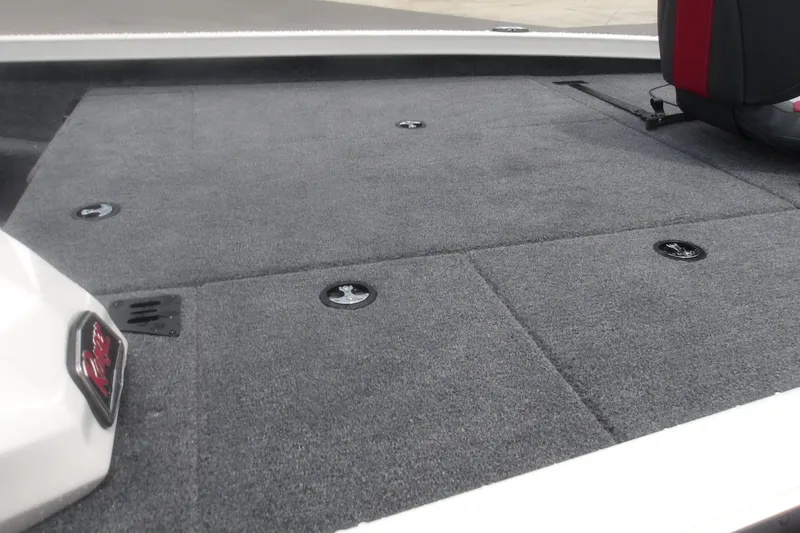 Slide: The Image of 2027 Ranger RT198P boat deck with carpeted surface and storage compartments. - 18