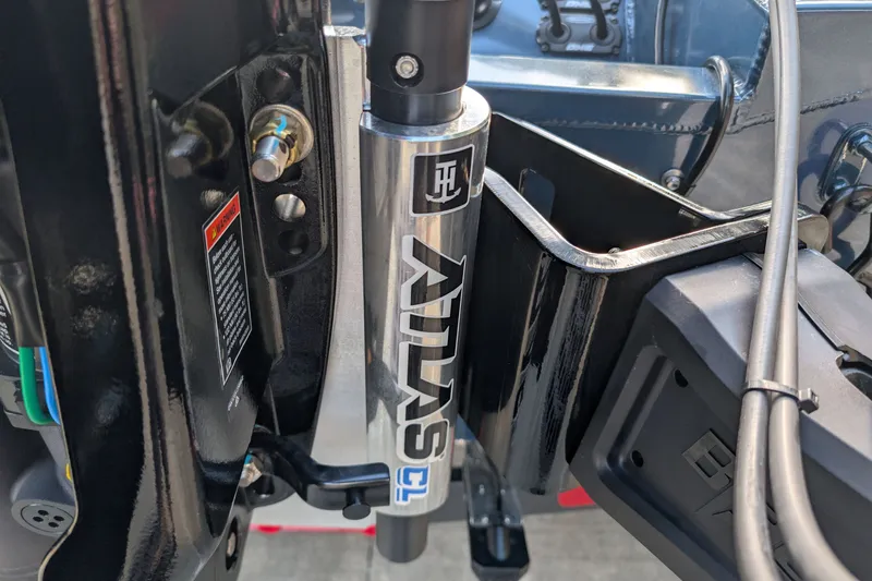 Slide: The Image of Close-up of a 2027 Ranger RT198P boat component with hydraulic system details. - 17