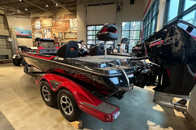 Slide: The Image of 2027 Nitro Z21 XL Pro boat with Mercury Pro XS engine in showroom. - 3