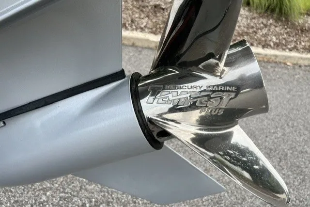 Slide: The Image of Propeller of a 2027 Nitro ZV20 Pro boat with Mercury Marine Tempest Plus branding. - 10
