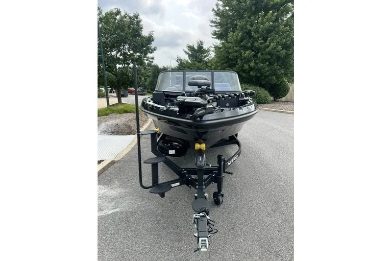 Slide: The Image of Front view of a 2027 Nitro ZV20 Pro boat on a trailer, parked on a road. - 7