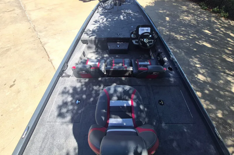 Slide: The Image of 2027 Ranger RT198P boat interior with seating and steering console. - 8