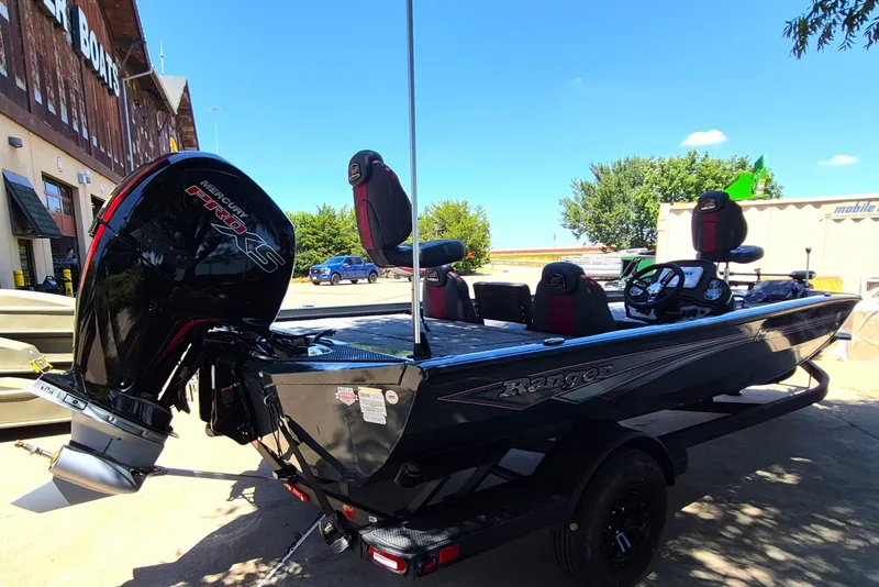 Slide: The Image of 2027 Ranger RT198P boat with Mercury Pro XS engine, parked outdoors. - 5