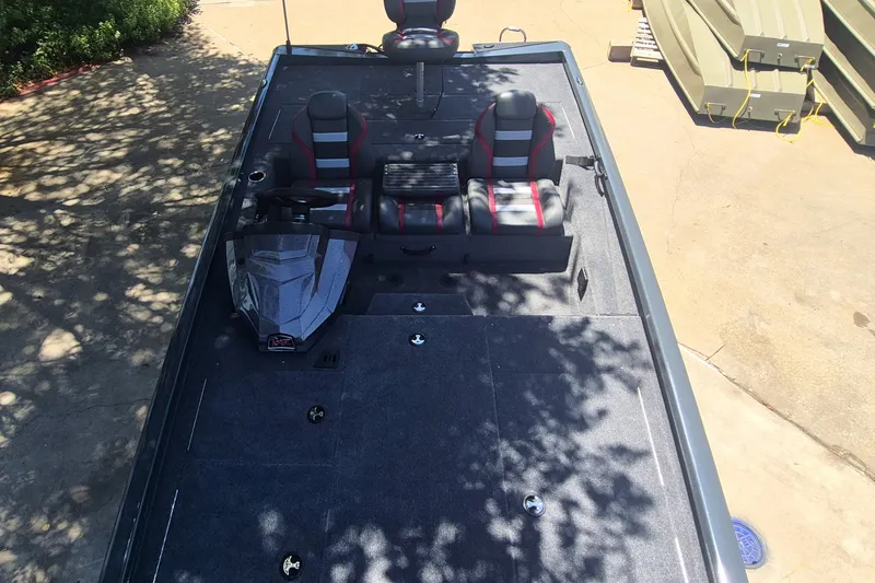 Slide: The Image of 2027 Ranger RT198P boat interior with dual seats and steering console. - 10