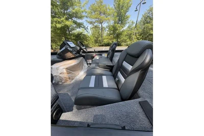 Slide: The Image of 2027 Ranger RT178 boat interior with sleek black and gray seating. - 7