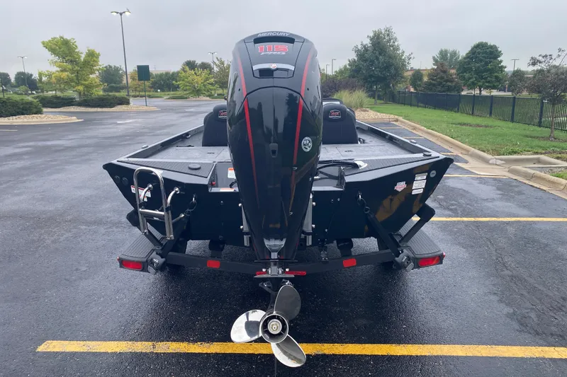 Slide: The Image of 2027 Ranger RT188P boat with Mercury outboard motor in a parking lot. - 4