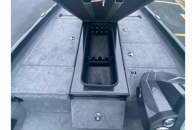 Slide: The Image of 2027 Ranger RT188P boat interior with open storage compartment, showcasing spacious design and functionality. - 10
