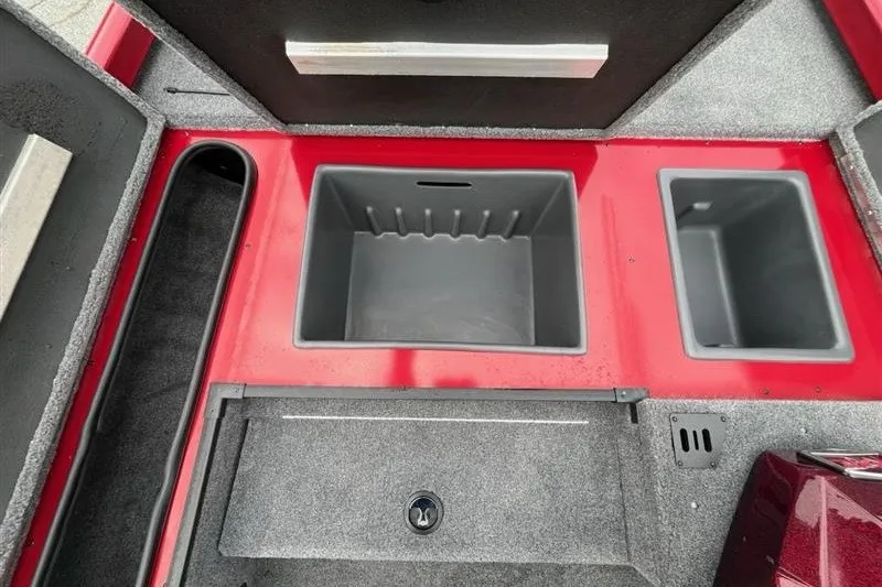 Slide: The Image of 2027 Ranger RT178 boat storage compartments with red and gray interior design. - 10