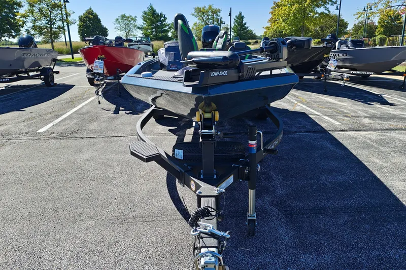 Slide: The Image of 2027 Ranger RT198P boat on trailer in parking lot, surrounded by other boats. - 6