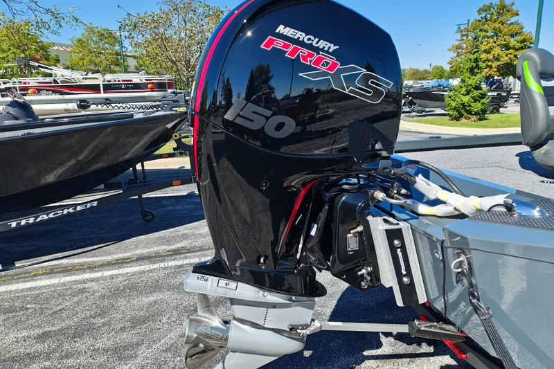Slide: The Image of Ranger RT198P 2027 boat with Mercury Pro XS 150 engine in a parking lot. - 10