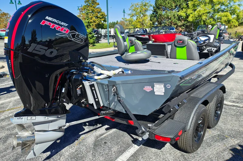 Slide: The Image of 2027 Ranger RT198P boat with Mercury Pro XS 150 engine, parked outdoors. - 8