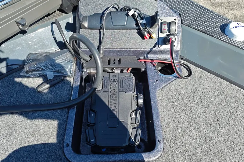 Slide: The Image of 2027 Ranger RT198P boat electronics compartment with Lowrance equipment and wiring. - 33